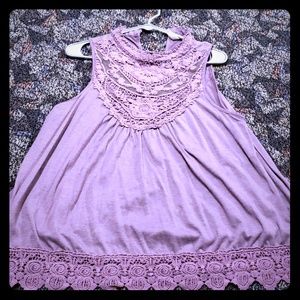 Lilac no sleeve high neck top.